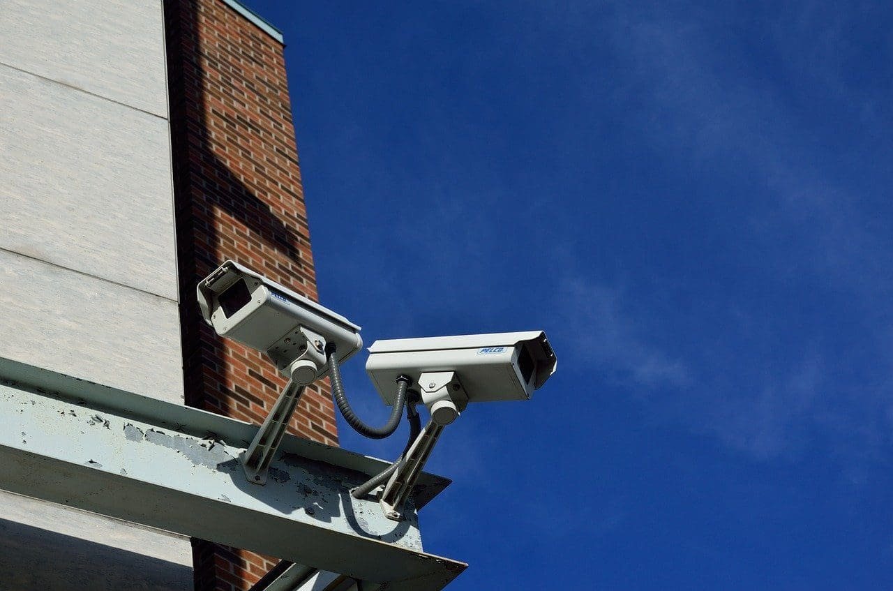 Security cameras mounted on a building